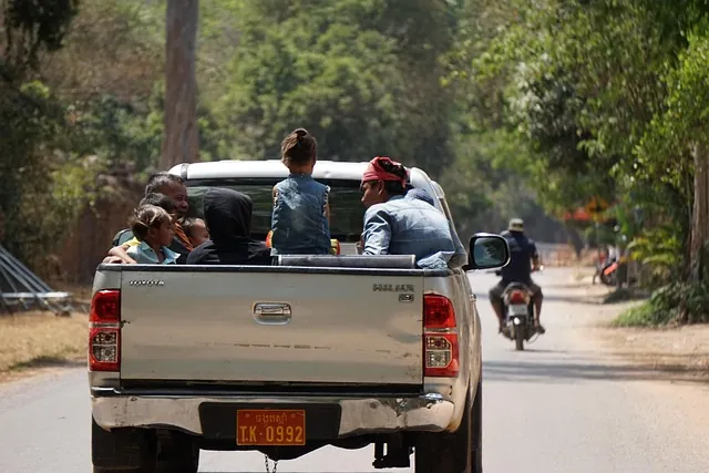 is it legal to ride in the bed of a truck in Georgia